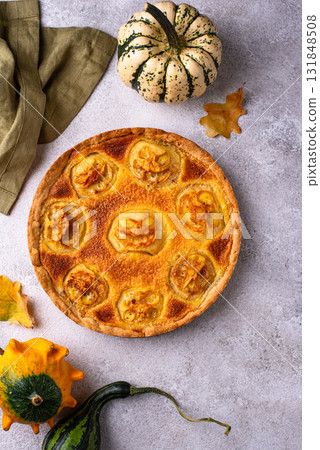 Halloween apple pie with scary faces Halloween apple pie with scary faces 131848508
