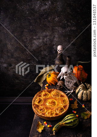 Halloween apple pie with scary faces Halloween apple pie with scary faces 131848537