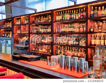 An assortment of high-class liquor in a luxury hotel bar. 131848835