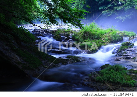 Fantastic waterfall shrouded in mist Fantastic waterfall shrouded in mist 131849471