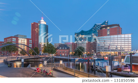 Jan Fedder Promenade day to night timelapse hyperlapse in Hamburg, Germany, a vibrant waterfront area. 131850596