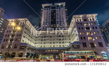 City traffic near the Peninsula hotel Hong Kong timelapse hyperlapse at night, Hong Kong City traffic near the Peninsula hotel Hong Kong timelapse hyperlapse at night, Hong Kong 131850612