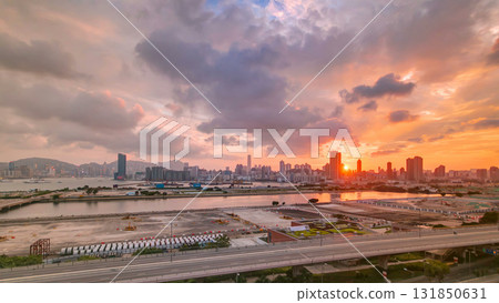 Top view of sunset in Hong Kong from kowloon bay downtown timelapse Top view of sunset in Hong Kong from kowloon bay downtown timelapse 131850631