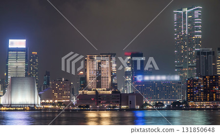 Hong Kong Cultural Centre with colorful light projection on its wall timelapse hyperlapse. 131850648