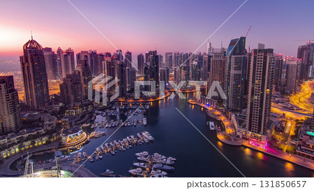 Dubai marina harbor panorama from night to day transition timelapse Dubai marina harbor panorama from night to day transition timelapse 131850657