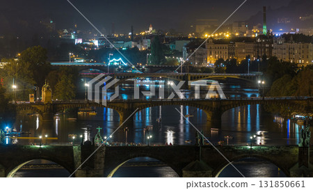 Aerial night view of the Vltava River and illuminated bridges timelapse, Prague 131850661