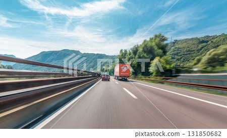 Driving on a highway through the mountains and meadows in Italy timelapse hyperlapse drivelapse Driving on a highway through the mountains and meadows in Italy timelapse hyperlapse drivelapse 131850682