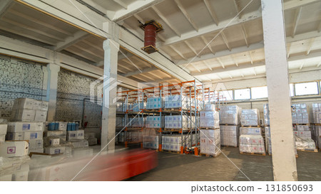 Forklift loader and cargo boxes storing at warehouse timelapse hyperlapse 131850693