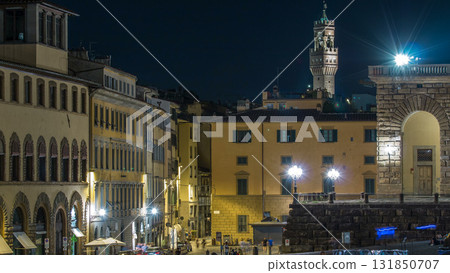 Tourists on a sloping square Piazza Pitti before the Palace Pitti at night Florence Tourists on a sloping square Piazza Pitti before the Palace Pitti at night Florence 131850707