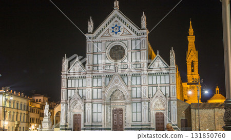Tourists on Piazza di Santa Croce at night timelapse hyperlapse with Basilica di Santa Croce Basilica of the Holy Cross in Florence city. Tourists on Piazza di Santa Croce at night timelapse hyperlapse with Basilica di Santa Croce Basilica of the Holy Cross in Florence city. 131850760