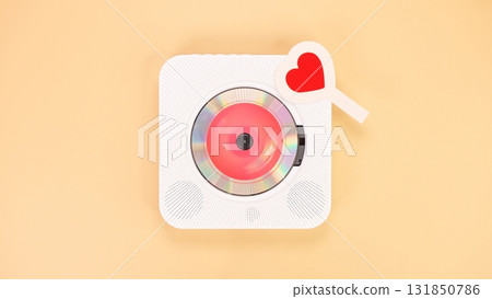 Trendy White CD Player with Red Heart Accent on Pastel Background. Modern Music Concept. 131850786