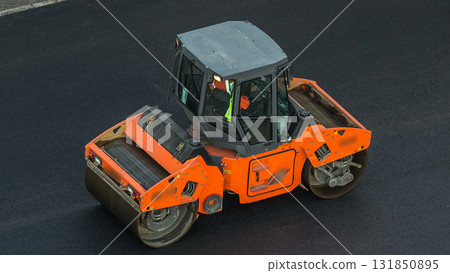 Large view on the road rollers working on the new road construction site timelapse 131850895