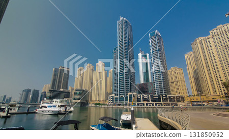 Dubai Marina skyscrapers. View from embankment timelapse 131850952