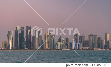 Skyline of Doha night to day transition timelapse in Qatar Skyline of Doha night to day transition timelapse in Qatar 131851015