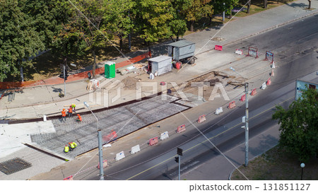 Road construction site with tram tracks repair and maintenance aerial timelapse. Road construction site with tram tracks repair and maintenance aerial timelapse. 131851127