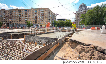 Road construction site with tram tracks repair and maintenance timelapse hyperlapse. Road construction site with tram tracks repair and maintenance timelapse hyperlapse. 131851133