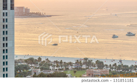 Sunset view of beach on JBR timelapse - Jumeirah Beach Residence in Dubai, United Arab Emirates 131851181