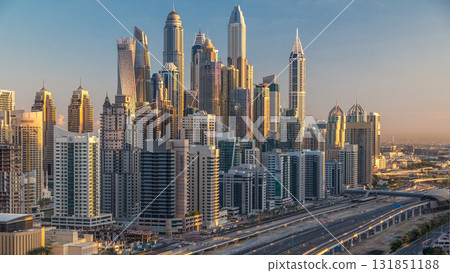 Dubai Marina skyscrapers aerial top view at sunrise from JLT in Dubai timelapse, UAE. 131851188