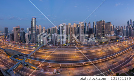 Dubai Marina skyscrapers aerial top view before sunrise from JLT in Dubai night to day timelapse, UAE. 131851189