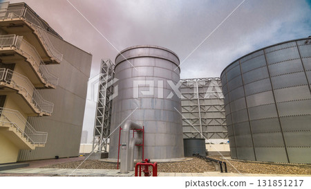 Two silver Water Tanks with fence timelapse hyperlapse Two silver Water Tanks with fence timelapse hyperlapse 131851217