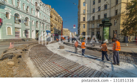 Workers do cutting reinforcement for tram tracks in the city timelapse Workers do cutting reinforcement for tram tracks in the city timelapse 131851316