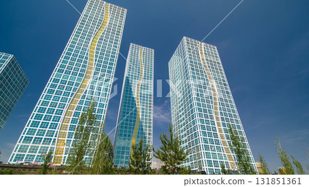 Modern towers of residential complex near Ishim River timelapse hyperlapse in Astana 131851361