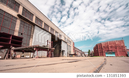 The old factory bricks building with windows and gates timelapse hyperlapse The old factory bricks building with windows and gates timelapse hyperlapse 131851393