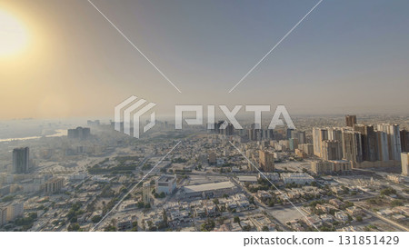 Cityscape of Ajman from rooftop during the morning after sunrise timelapse. Cityscape of Ajman from rooftop during the morning after sunrise timelapse. 131851429