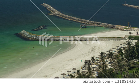 Beautiful area of beach in Ajman timelapse near the turquoise waters of Arabian Gulf. Beautiful area of beach in Ajman timelapse near the turquoise waters of Arabian Gulf. 131851436