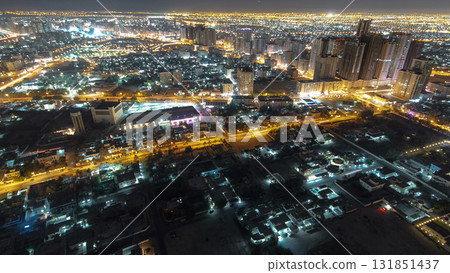 Cityscape of Ajman from rooftop night aerial timelapse Cityscape of Ajman from rooftop night aerial timelapse 131851437