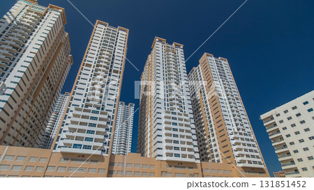 Modern new towers in Ajman timelapse hyperlapse. Cityscape of Ajman. Modern new towers in Ajman timelapse hyperlapse. Cityscape of Ajman. 131851452