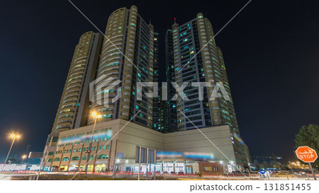 Modern new towers in Ajman night timelapse hyperlapse. Cityscape of Ajman. Modern new towers in Ajman night timelapse hyperlapse. Cityscape of Ajman. 131851455