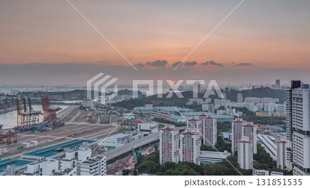 Sunset over commercial port of Singapore timelapse. 131851535