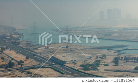 Skylines under the thick fog at the street timelapse of Abu Dhabi at morning 131851564