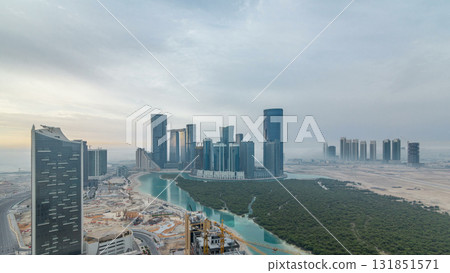 Buildings on Al Reem island in Abu Dhabi timelapse from above Buildings on Al Reem island in Abu Dhabi timelapse from above 131851571