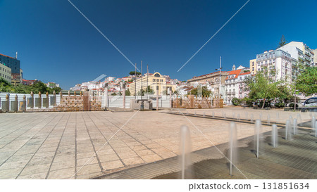 Fountain in Martim Moniz square timelapse hyperlapse in downtown Lisbon 131851634