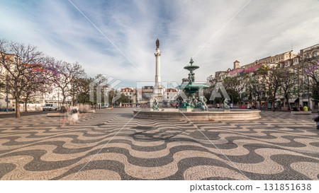 Rossio square with fountain and monument on column located at Baixa district timelapse hyperlapse in Lisbon, Portugal Rossio square with fountain and monument on column located at Baixa district timelapse hyperlapse in Lisbon, Portugal 131851638