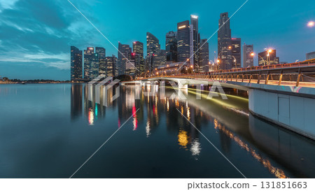 Esplanade bridge and downtown core skyscrapers in the background Singapore night to day timelapse Esplanade bridge and downtown core skyscrapers in the background Singapore night to day timelapse 131851663
