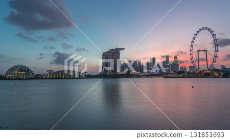 Downtown skyline of Singapore as viewed from across the water from The Garden East day to night timelapse. Singapore. Downtown skyline of Singapore as viewed from across the water from The Garden East day to night timelapse. Singapore. 131851693