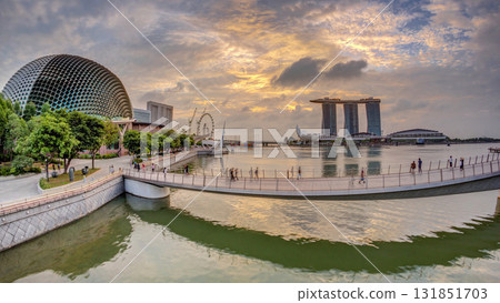Skyline in Marina Bay with Esplanade Theaters on the Bay and Esplanade footbridge early morning timelapse in Singapore. Skyline in Marina Bay with Esplanade Theaters on the Bay and Esplanade footbridge early morning timelapse in Singapore. 131851703