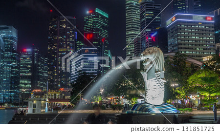 The Merlion fountain and Singapore skyline night timelapse hyperlapse. 131851725