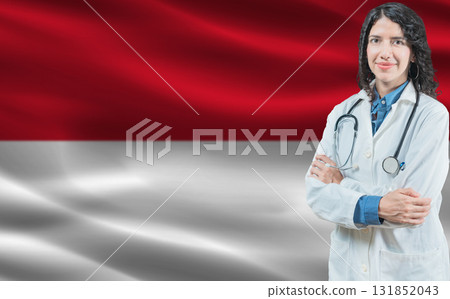 Monegasque medicine and healthcare concept. Doctor close up against Monaco flag background 131852043