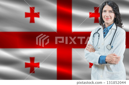 Georgian medicine and healthcare concept. Doctor close up against Georgia flag background 131852044
