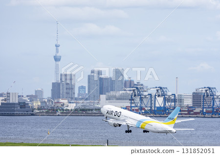 Scenery of Haneda Airport, plane taking off and Tokyo Skytree, Ota Ward, Tokyo 131852051