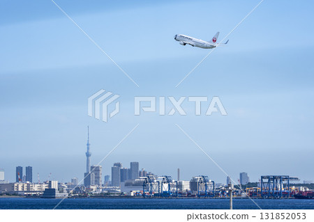 Scenery of Haneda Airport, plane taking off and Tokyo Skytree, Ota Ward, Tokyo 131852053