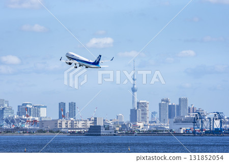 Scenery of Haneda Airport, plane taking off and Tokyo Skytree, Ota Ward, Tokyo 131852054