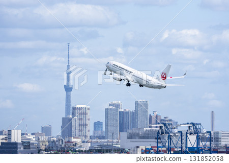 Scenery of Haneda Airport, plane taking off and Tokyo Skytree, Ota Ward, Tokyo 131852058
