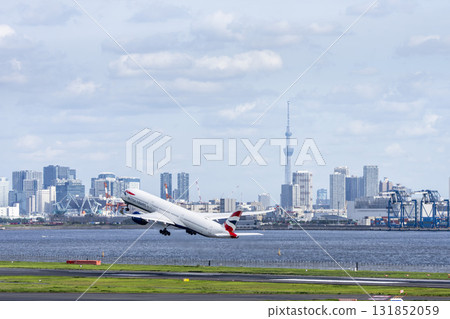 Scenery of Haneda Airport, plane taking off and Tokyo Skytree, Ota Ward, Tokyo 131852059
