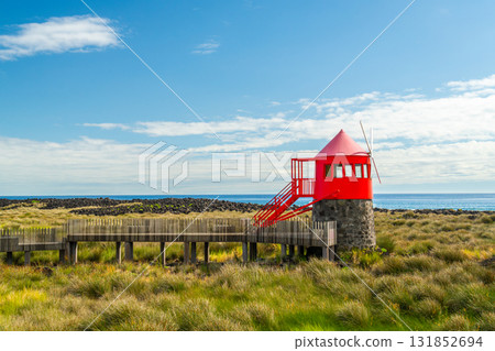 Moinho do Juncal Windmill and Atlantic Ocean. Azores, Pico Island. Portugal 131852694