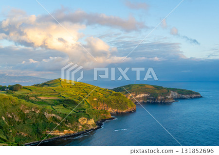 Green Lush Hills. Atlantic Ocean. Azores, Sao Miguel Island, Portugal Green Lush Hills. Atlantic Ocean. Azores, Sao Miguel Island, Portugal 131852696